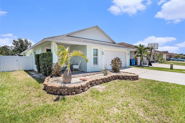 view of front of property featuring concrete driveway, a garage, stucco siding, a shingled roof, and a gate