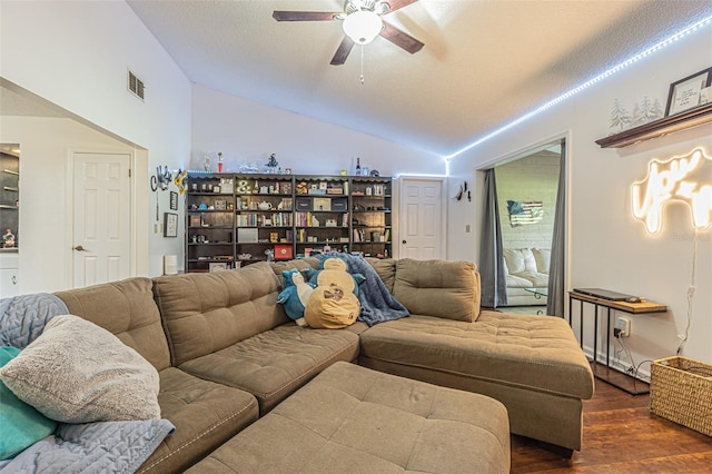 35058 Whispering Oaks Blvd, Dade City, FL 33523 - living room with vaulted ceiling, ceiling fan, and wood finished floors