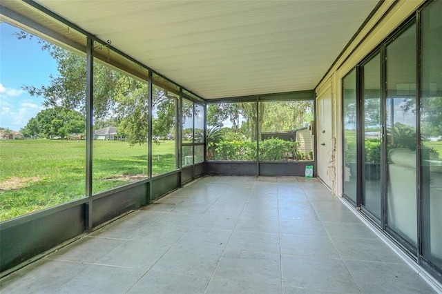 35058 Whispering Oaks Blvd, Dade City, FL 33523 - unfurnished sunroom featuring plenty of natural light