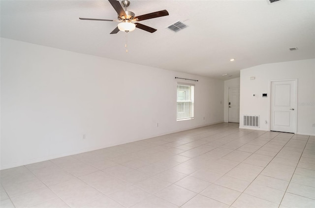 unfurnished room featuring a ceiling fan, vaulted ceiling, recessed lighting, and light tile patterned floors