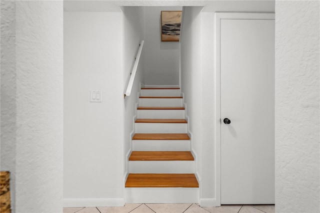 108 Biscayne Ave Unit B, Tampa, FL 33606 - stairs with tile patterned flooring and a textured wall