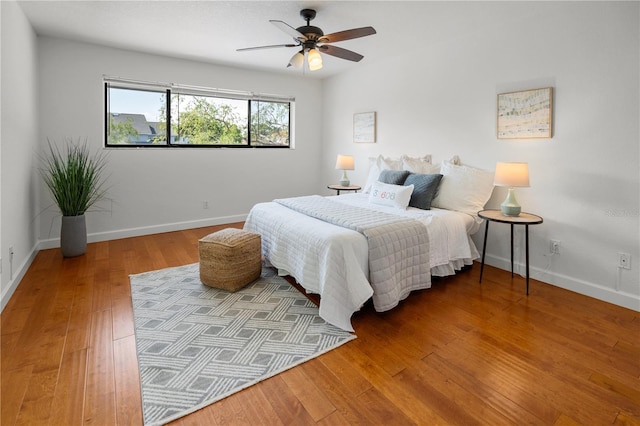 108 Biscayne Ave Unit B, Tampa, FL 33606 - bedroom with baseboards, wood finished floors, and a ceiling fan