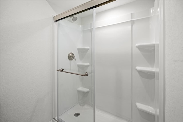 108 Biscayne Ave Unit B, Tampa, FL 33606 - full bath featuring a shower stall and a textured wall