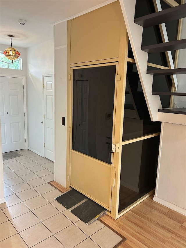 3145 Meta Ct, Largo, FL 33771 - entryway with light wood-style flooring and baseboards