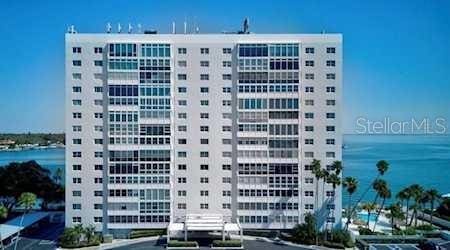 view of building exterior with a water view