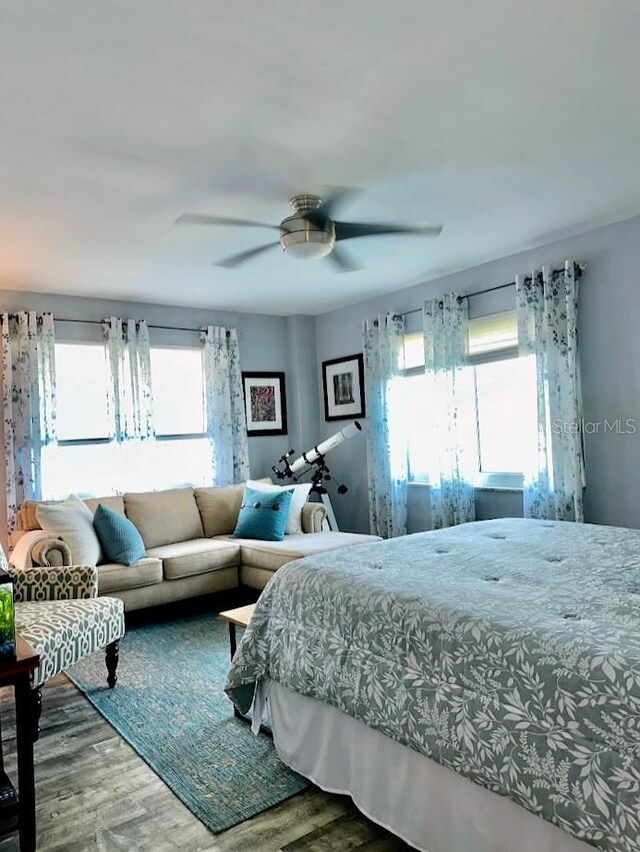 7200 Sunshine Skyway Ln S Unit 2E, Saint Petersburg, FL 33711 - bedroom featuring wood finished floors and ceiling fan
