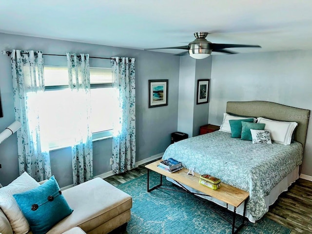 7200 Sunshine Skyway Ln S Unit 2E, Saint Petersburg, FL 33711 - bedroom featuring wood finished floors, baseboards, and a ceiling fan