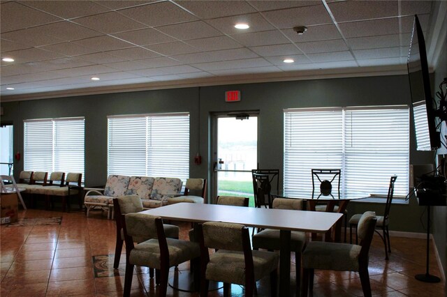 7200 Sunshine Skyway Ln S Unit 2E, Saint Petersburg, FL 33711 - tiled dining room featuring baseboards, a drop ceiling, and recessed lighting
