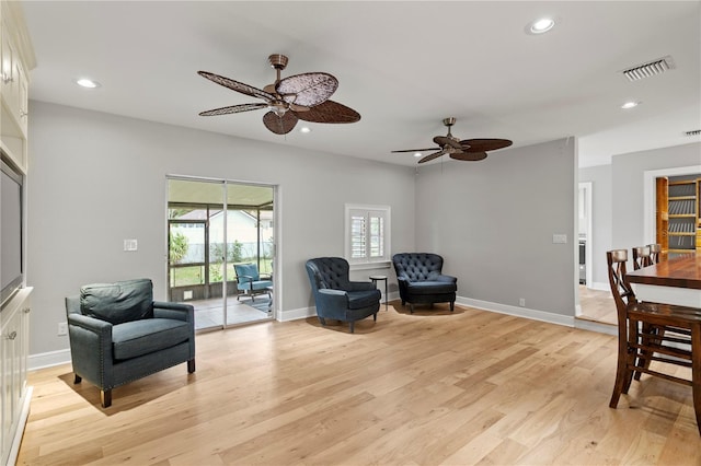 493 Lucerne Ave, Tampa, FL 33606 - living area featuring ceiling fan, light wood-style flooring, recessed lighting, and baseboards