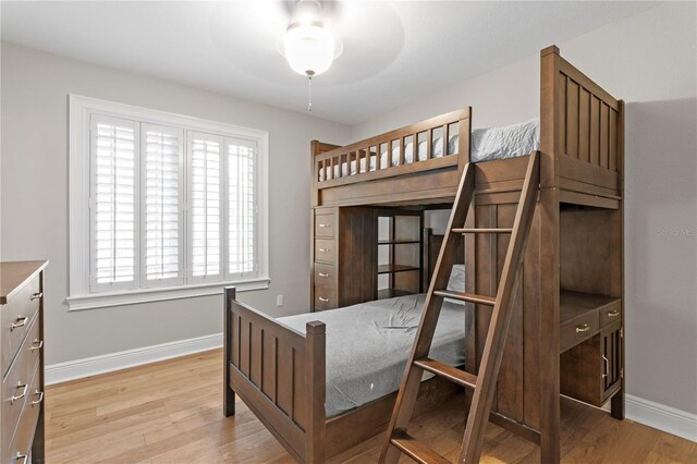 493 Lucerne Ave, Tampa, FL 33606 - bedroom featuring baseboards and wood finished floors