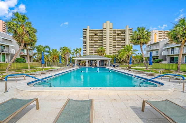1351 Gulf Blvd Unit 209, Clearwater Beach, FL 33767 - community pool featuring fence, a patio area, and a gazebo