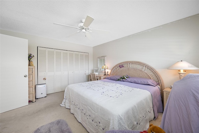 1351 Gulf Blvd Unit 209, Clearwater Beach, FL 33767 - bedroom featuring light carpet, a closet, and ceiling fan