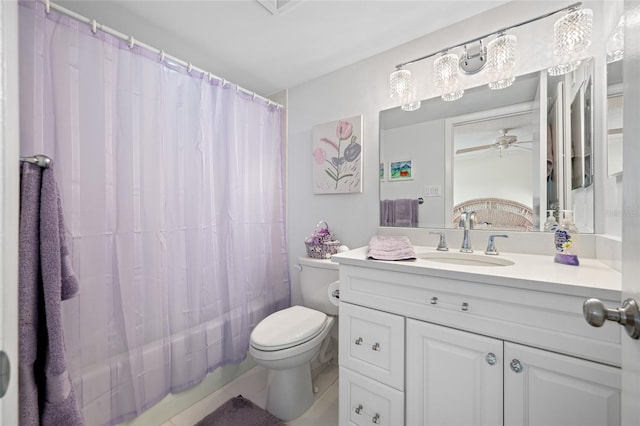 1351 Gulf Blvd Unit 209, Clearwater Beach, FL 33767 - full bath featuring toilet, ceiling fan, vanity, tile patterned floors, and shower / bath combination with curtain