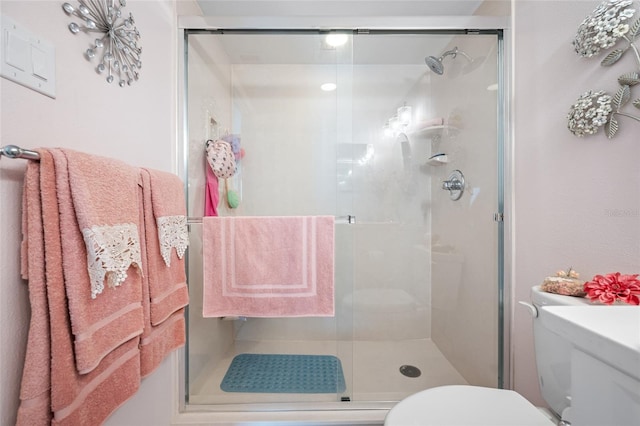 1351 Gulf Blvd Unit 209, Clearwater Beach, FL 33767 - bathroom with toilet and a stall shower