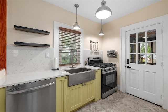 931 28th Ave N, Saint Petersburg, FL 33704 - kitchen featuring stainless steel appliances, a sink, healthy amount of natural light, and light countertops