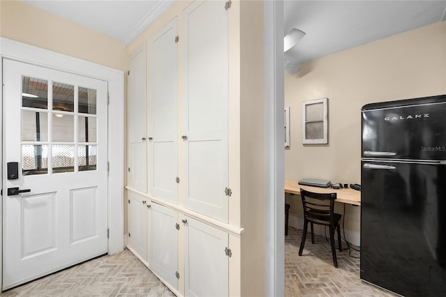 931 28th Ave N, Saint Petersburg, FL 33704 - doorway with a desk and brick patterned floors