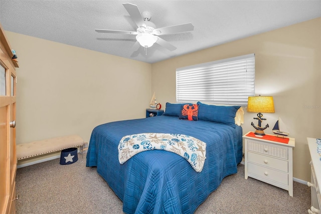bedroom featuring carpet, ceiling fan, and baseboards