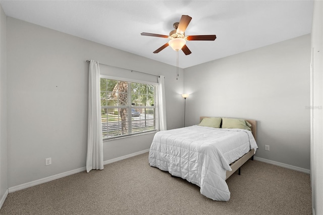 bedroom featuring baseboards, carpet, and ceiling fan