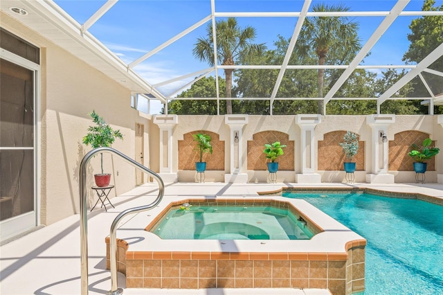 7206 River Country Dr, Weeki Wachee, FL 34607 - outdoor pool featuring a patio area, an in-ground hot tub, and a lanai