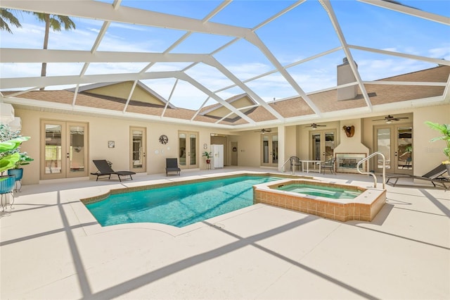 7206 River Country Dr, Weeki Wachee, FL 34607 - view of swimming pool with french doors, a ceiling fan, a patio, and a pool with connected hot tub