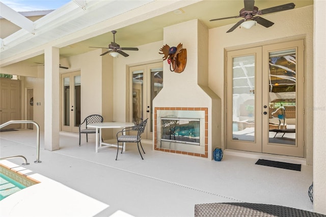 7206 River Country Dr, Weeki Wachee, FL 34607 - view of patio / terrace featuring french doors and a ceiling fan