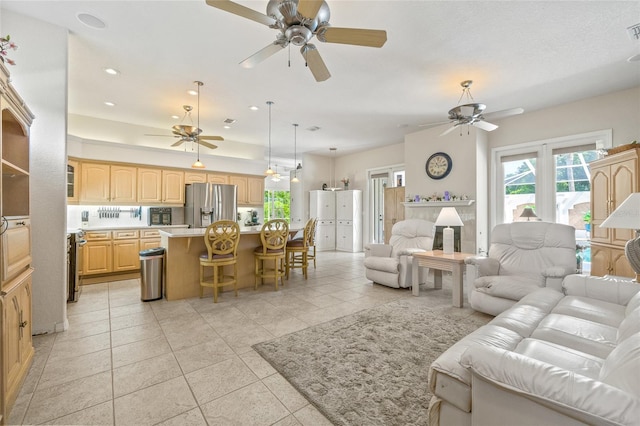 7206 River Country Dr, Weeki Wachee, FL 34607 - living area with a ceiling fan, light tile patterned floors, and recessed lighting