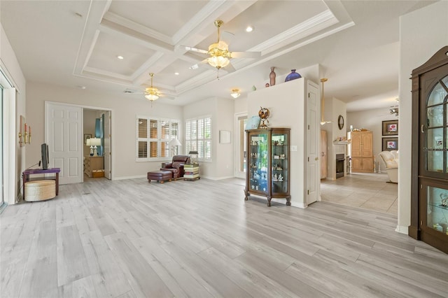 7206 River Country Dr, Weeki Wachee, FL 34607 - living room with a ceiling fan, coffered ceiling, light wood-style floors, beamed ceiling, and crown molding