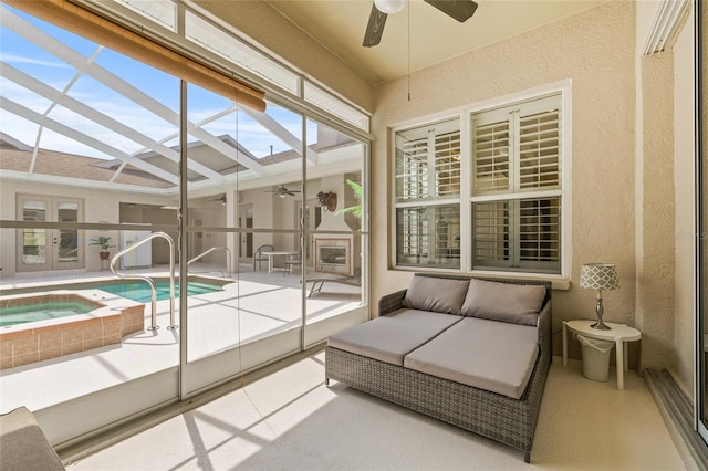 7206 River Country Dr, Weeki Wachee, FL 34607 - sunroom featuring french doors, a hot tub, and a skylight