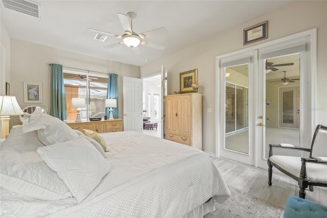 7206 River Country Dr, Weeki Wachee, FL 34607 - bedroom featuring light wood finished floors, a ceiling fan, and access to exterior