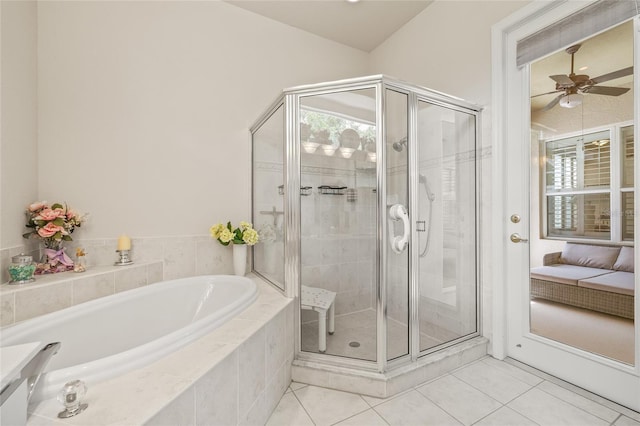 7206 River Country Dr, Weeki Wachee, FL 34607 - full bath featuring tile patterned floors, a shower stall, and a garden tub