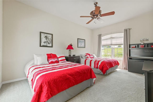 7206 River Country Dr, Weeki Wachee, FL 34607 - bedroom with carpet, baseboards, and ceiling fan