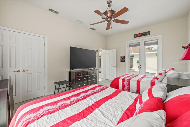 7206 River Country Dr, Weeki Wachee, FL 34607 - bedroom with access to outside, carpet floors, a ceiling fan, french doors, and a closet