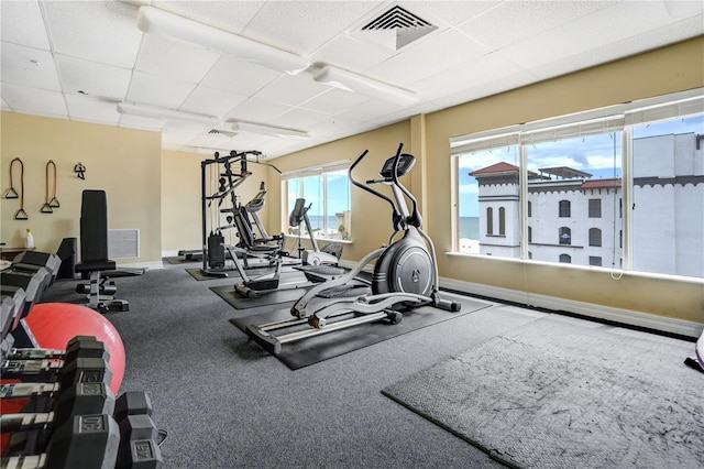13235 Gulf Blvd Unit 402, Saint Petersburg, FL 33708 - workout area with a paneled ceiling and baseboards