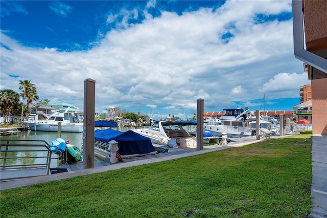 13235 Gulf Blvd Unit 402, Saint Petersburg, FL 33708 - dock featuring a yard and a water view