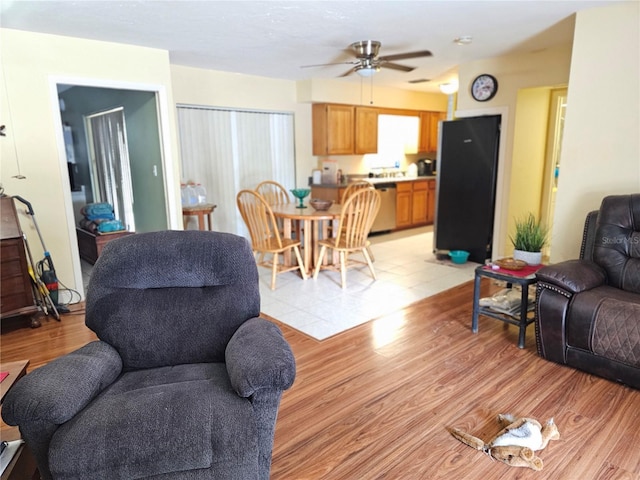 1114 27th St SE Unit A, Ruskin, FL 33570 - living area featuring ceiling fan and light wood-type flooring