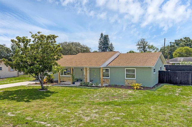 4727 Wales St, Lake Wales, FL 33859 - ranch-style house with stucco siding, roof with shingles, and covered porch