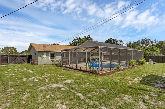 4727 Wales St, Lake Wales, FL 33859 - rear view of house featuring a patio area and a gate