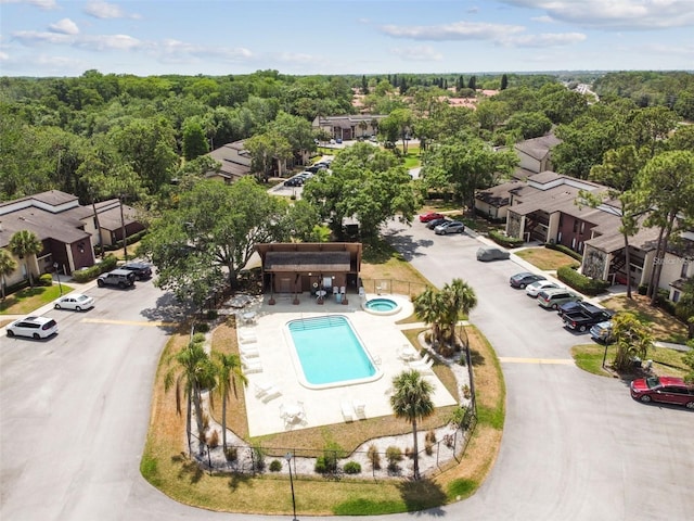 aerial perspective of suburban area with a pool area