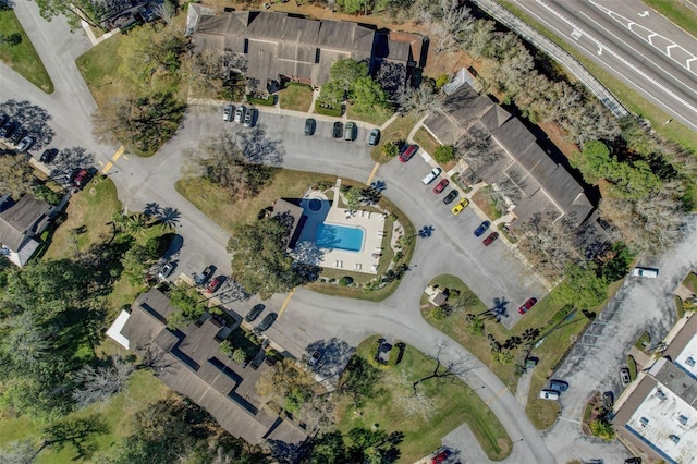 aerial overview of property's location featuring a pool