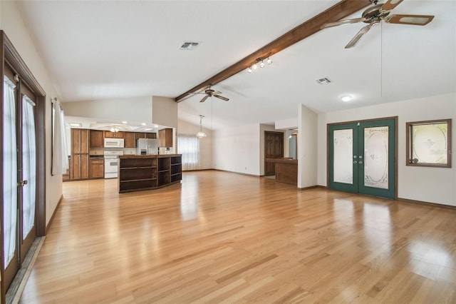 unfurnished living room with a ceiling fan, french doors, light wood-style flooring, and baseboards