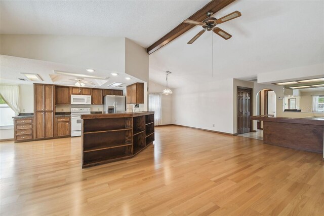 living room featuring ceiling fan, arched walkways, beam ceiling, light wood-type flooring, and high vaulted ceiling