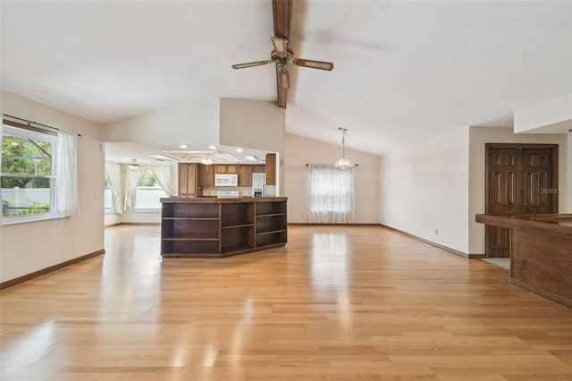 unfurnished living room with a ceiling fan, light wood finished floors, and baseboards