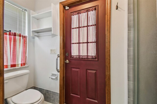 bathroom featuring toilet