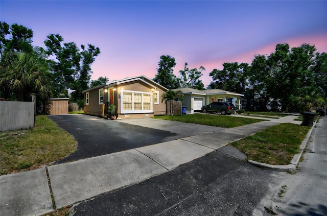 2018 21st St S, Saint Petersburg, FL 33712 - ranch-style home featuring asphalt driveway, stucco siding, and fence