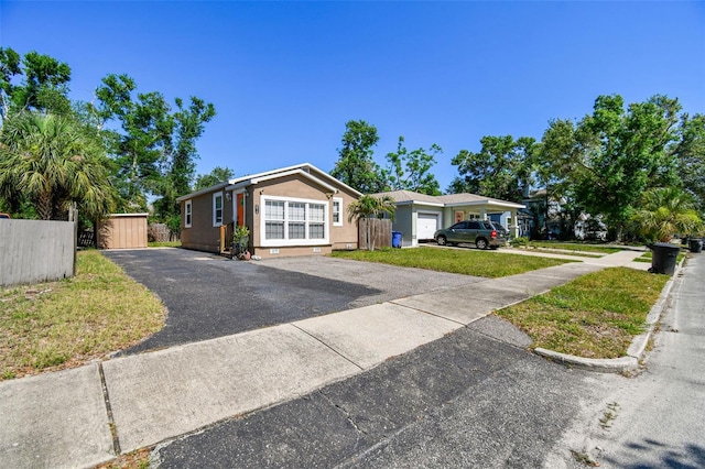 2018 21st St S, Saint Petersburg, FL 33712 - ranch-style house featuring asphalt driveway and stucco siding