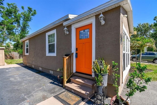 2018 21st St S, Saint Petersburg, FL 33712 - property entrance with crawl space and stucco siding