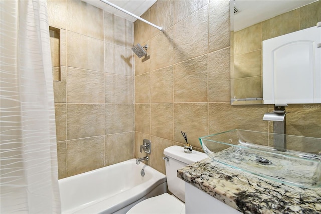 2018 21st St S, Saint Petersburg, FL 33712 - full bath with tile walls, shower / tub combo, toilet, and vanity