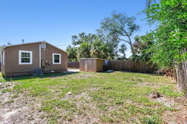 2018 21st St S, Saint Petersburg, FL 33712 - view of yard with a storage unit, an outbuilding, and central AC unit