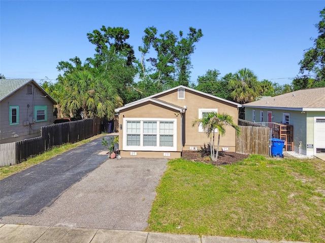 2018 21st St S, Saint Petersburg, FL 33712 - view of front of house featuring stucco siding and asphalt driveway