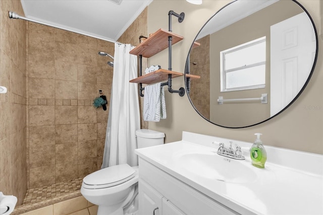 full bath with toilet, vanity, and tiled shower